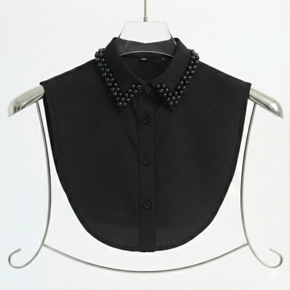 Embroidered, lace, guipure, and satin shirt collar collection featuring elegant designs and premium fabrics that add a feminine and luxurious touch to everyday and formal looks – black , lavito scarf 
كولكشن ياقات شميز مطرزة، دانتيل، جوبير وستان بتصاميم أنيقة وخامات مميزة تضيف لمسة أنوثة وفخامة للإطلالات اليومية والرسمية , اسود – لافيتو سكارف